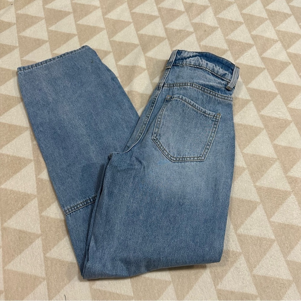 Universal standard medium wash high rise straight leg jeans